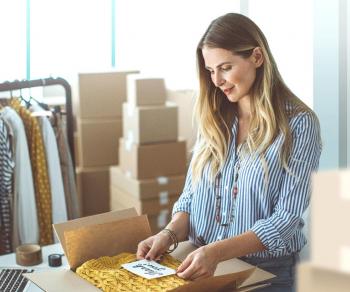 Woman preparing an online order for a customer