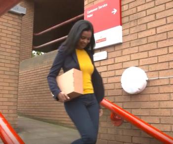 Woman returning a parcel